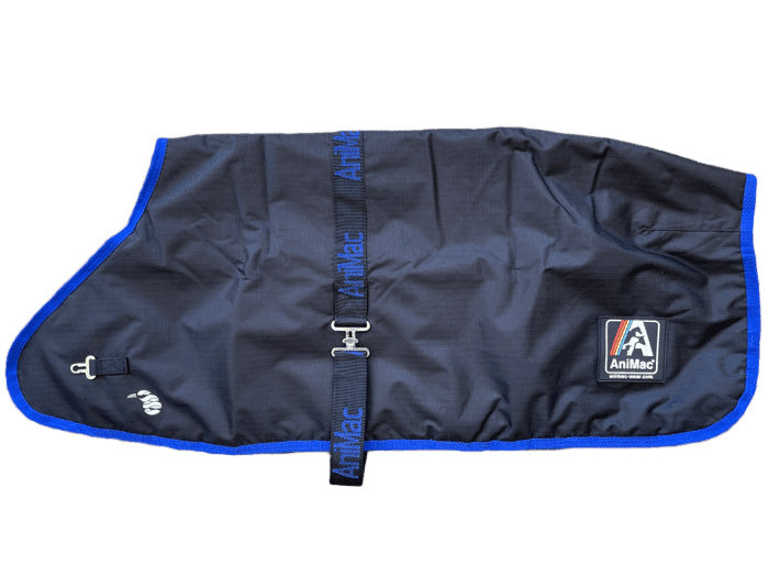 The Alpaca Coat | Waterproof is a black horse rug with blue trim, featuring chest and belly straps with AniMac text, and the AniMac logo on the lower right—crafted for comfort like a breathable alpaca coat.