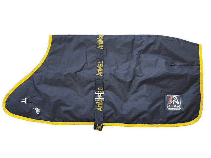 A navy blue waterproof alpaca coat with yellow trim, AniMac branding on the strap and edge, a buckle, and AniMac logo patch. The Alpaca Coat | Waterproof is laid flat to display its shape and design.