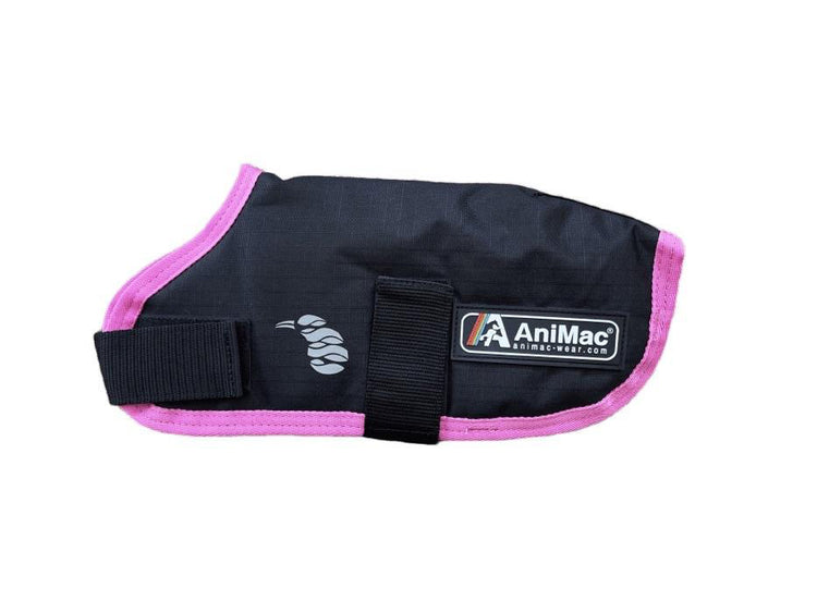 The Lamb Coat | Waterproof is a black lamb jacket with pink trim, Velcro strap, AniMac patch with website, and a small white side logo. It’s stylish and practical—perfect for keeping your pet lamb dry.